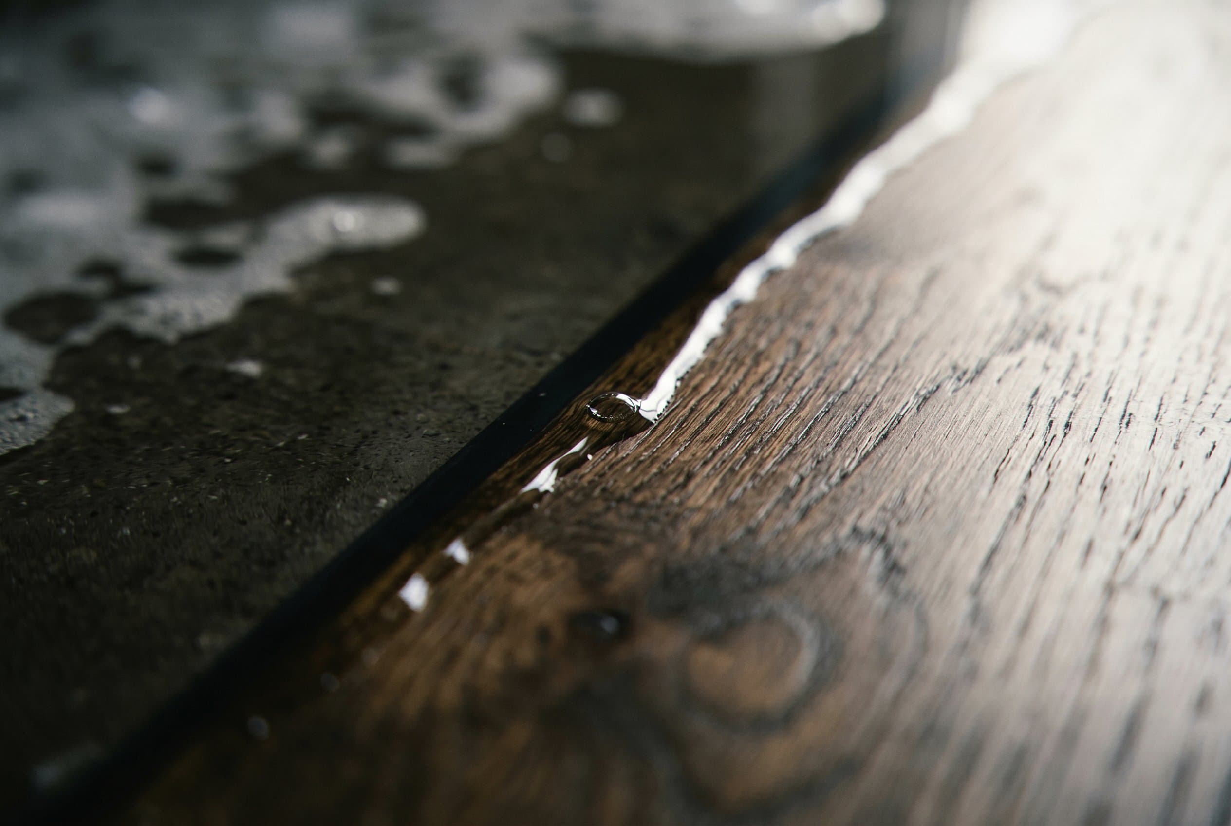 Moisture meter reading in damp drywall.